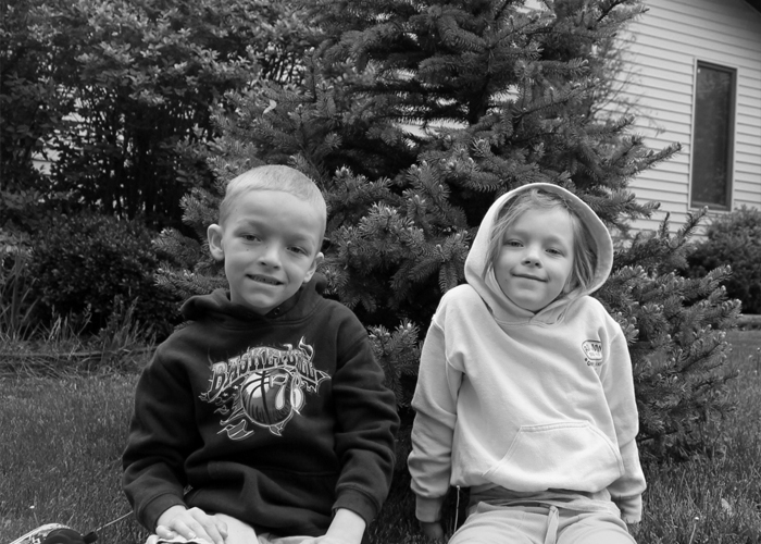 black and white picture of a borther and sister